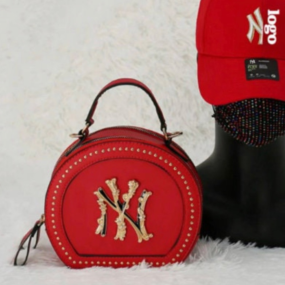 NY GOLD EMBLEM ROUND PURSE